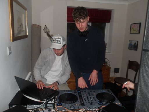 Jerry Agar Episode Four Two young men behind a DJ setup, one using a laptop and the other at the turntables.